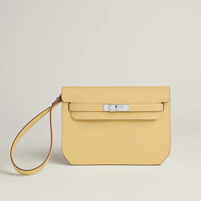 Pale yellow Kelly Dépêches pouch from the Hermès Kelly family